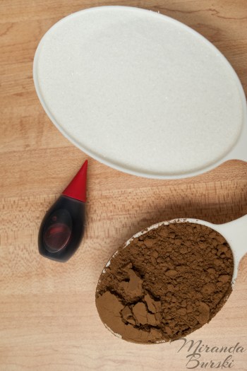 Sugar, cocoa powder, and red food colouring