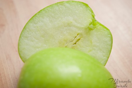 A green apple cut in half