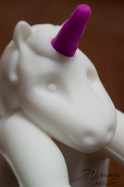 A close-up of a Unicorn tea infuser