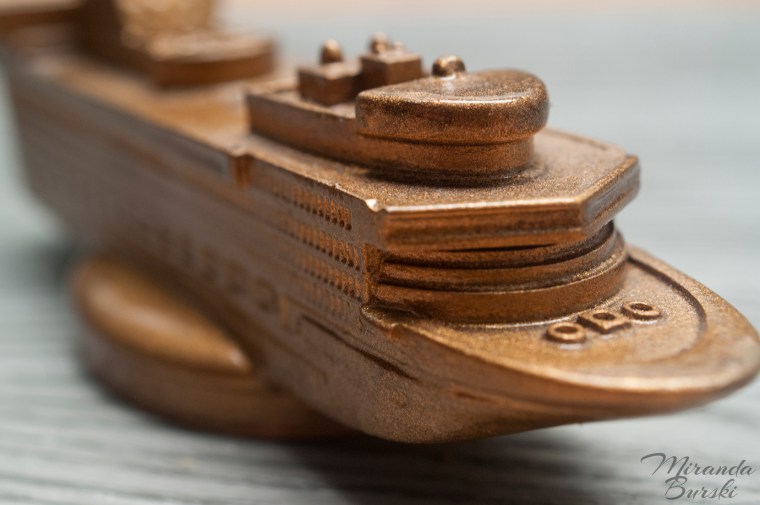 A gold-coloured cruise ship urn