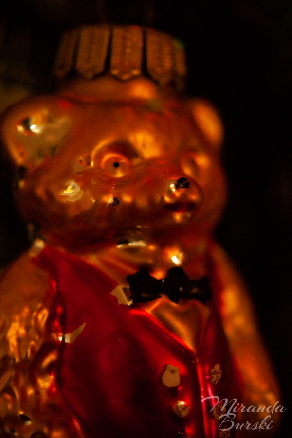 A glass Christmas ornament, shaped like a bear