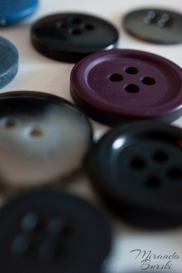 A collection of buttons of various colours.